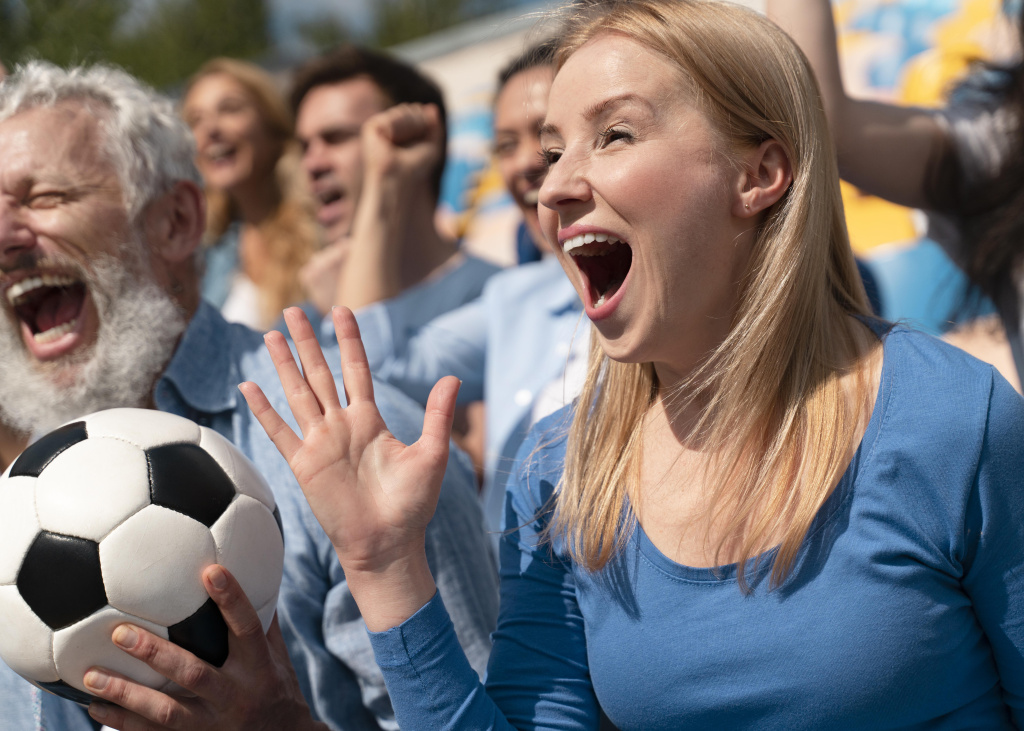 people-looking-at-a-football-game-in-a-sunny-day.jpg people-looking-at-a-football-game-in-a-sunny-day.jpg